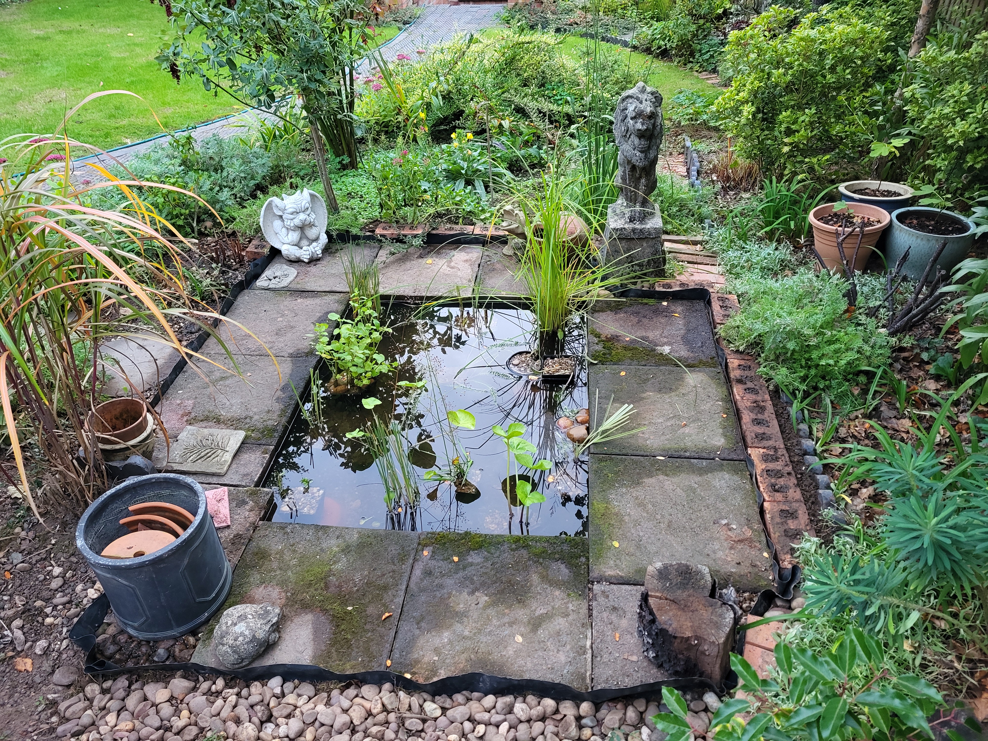 Nearly done! Plants a decorations are now in place. There's just the pond liner to finish off. At this stage I hadn't worked out exactly what to do with it. 